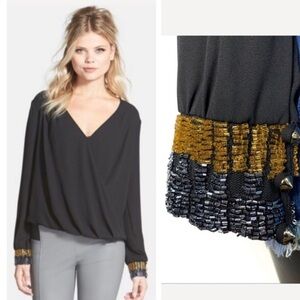ASTR the Label black V-neck wrap blouses with beaded cuffs high low
